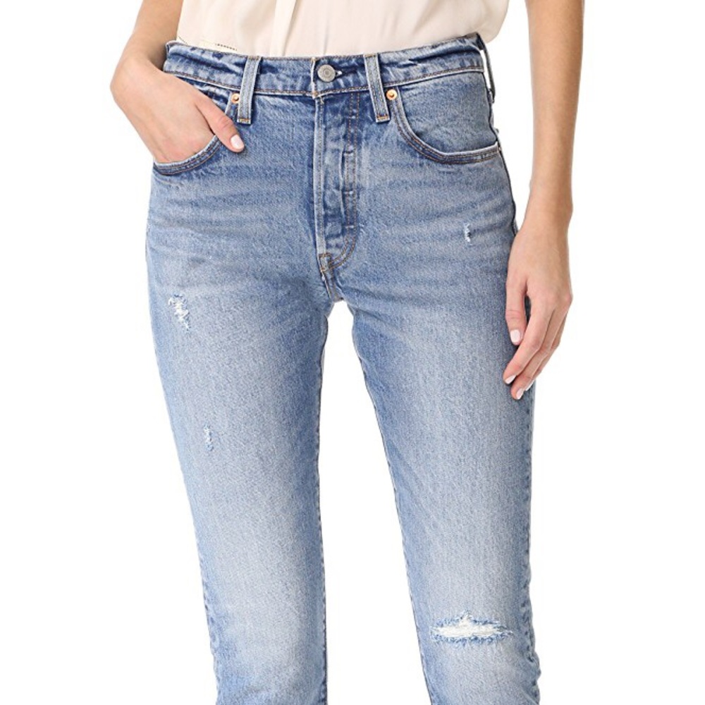 Classic Levi's 501 jeans (faded wash, button fly)